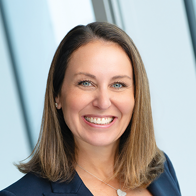 Headshot of Jill Dinerman smiling at the camera.