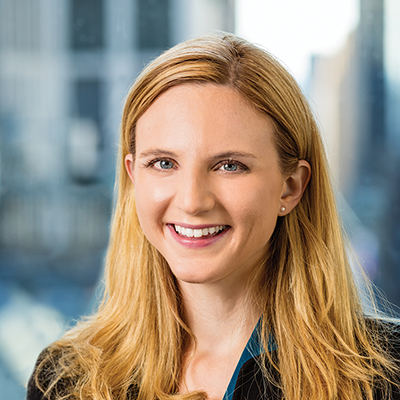Headshot of Melanie Gounardes smiling at the camera.