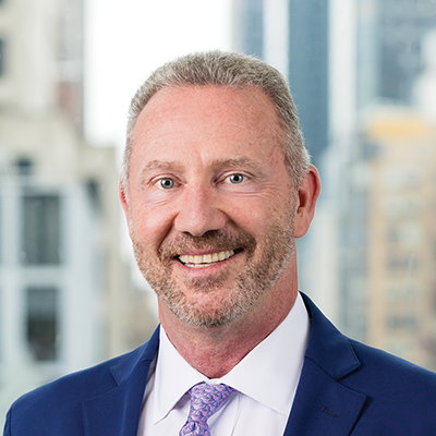Headshot of Robert Shettle smiling at the camera.