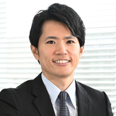 Headshot of Takahiro Sugahara smiling at the camera.