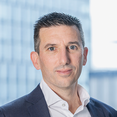 Headshot of Alastair Wright looking at the camera.