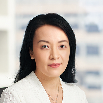 Headshot of Lydia Wu smiling at the camera.