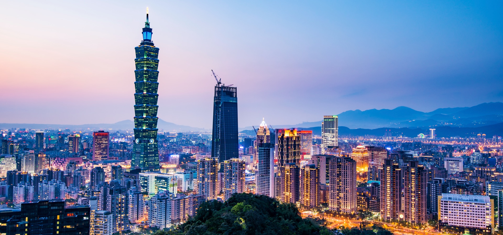Skyline view of Taipei, Taiwan at twilight. 
