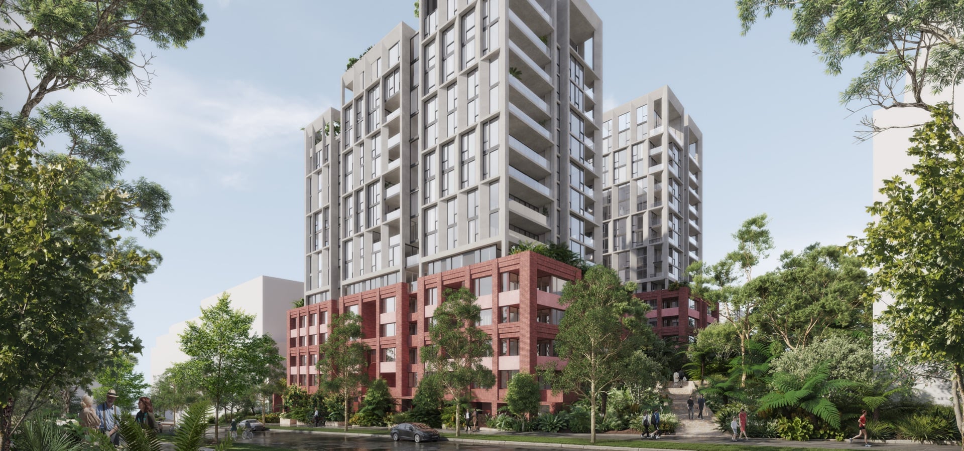 A residential building with trees and people walking around.